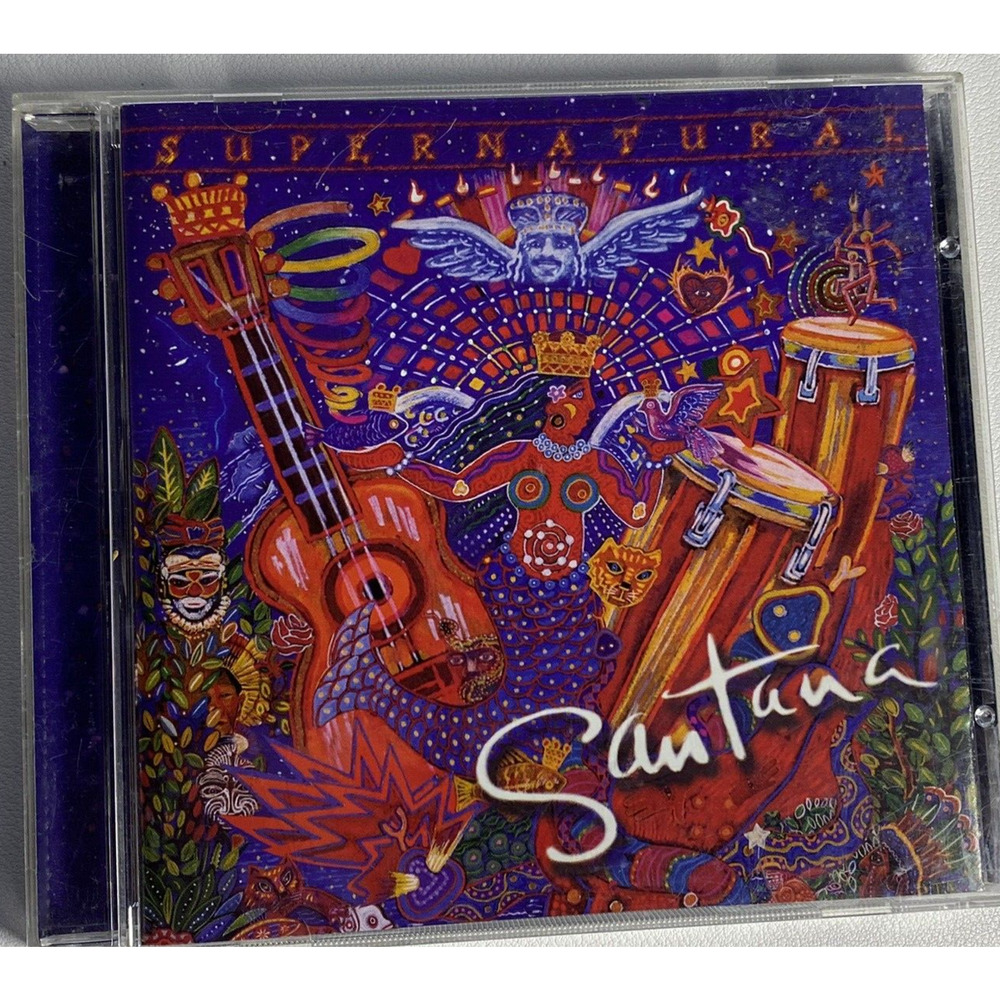 Santana Supernatural Vintage Rock Music 1999 Arista CD + Album Booklet